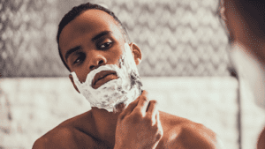 Man using shaving cream