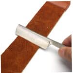 a straight razor with a belt