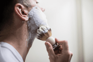 Lather your face with shaving soap